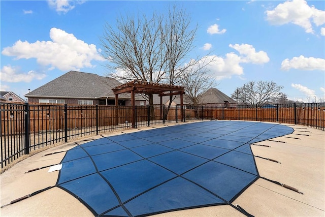 view of pool featuring a fenced in pool, a patio, a fenced backyard, and a pergola