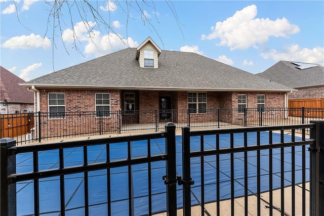 view of pool featuring a patio area and fence