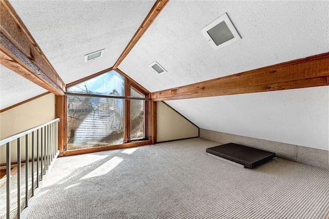 bonus room featuring vaulted ceiling, carpet, and a textured ceiling