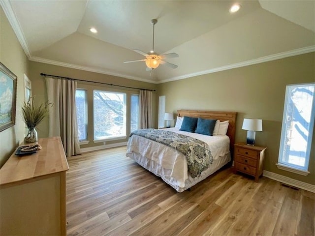 bedroom featuring baseboards, lofted ceiling, light wood-style flooring, recessed lighting, and crown molding