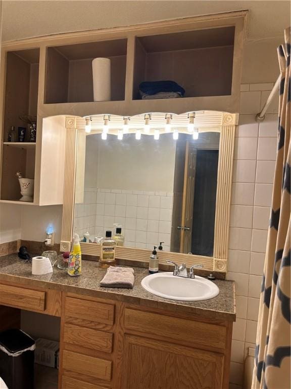 bathroom with vanity and a shower with shower curtain