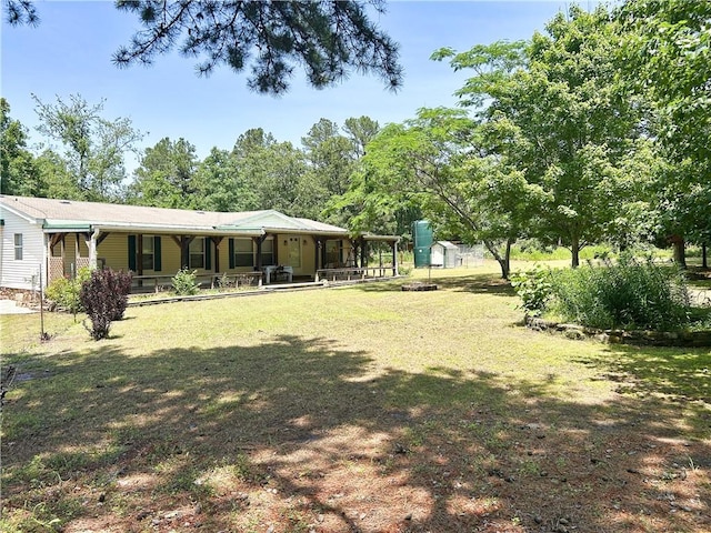 476359 791st Rd, Stilwell, OK 74960 - view of green lawn featuring a porch