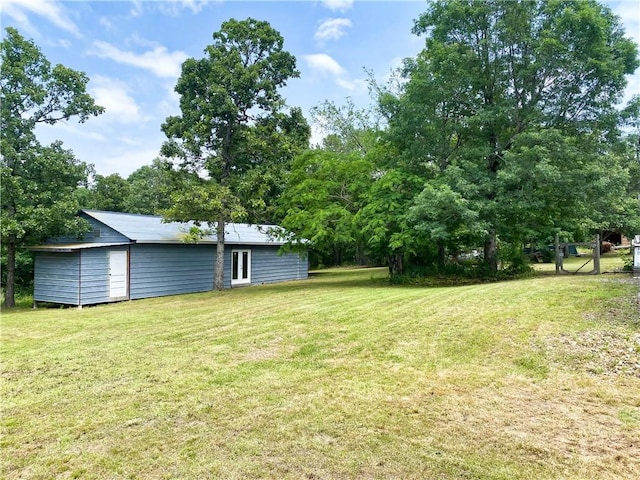 476359 791st Rd, Stilwell, OK 74960 - view of grassy yard featuring french doors