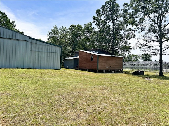 476359 791st Rd, Stilwell, OK 74960 - view of yard with an outbuilding