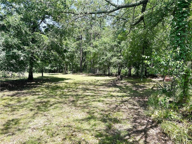 476359 791st Rd, Stilwell, OK 74960 - view of grassy yard featuring a view of trees