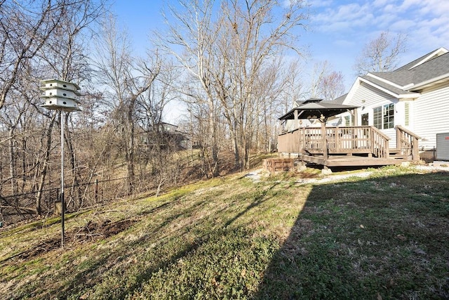 view of yard with a deck and a gazebo