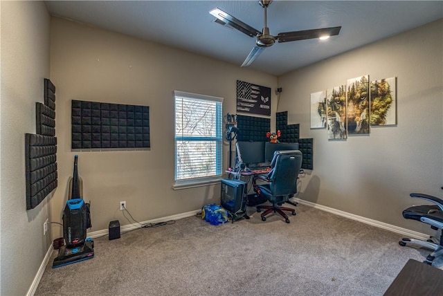 office space featuring baseboards, carpet, and ceiling fan