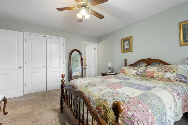 carpeted bedroom with a closet and ceiling fan