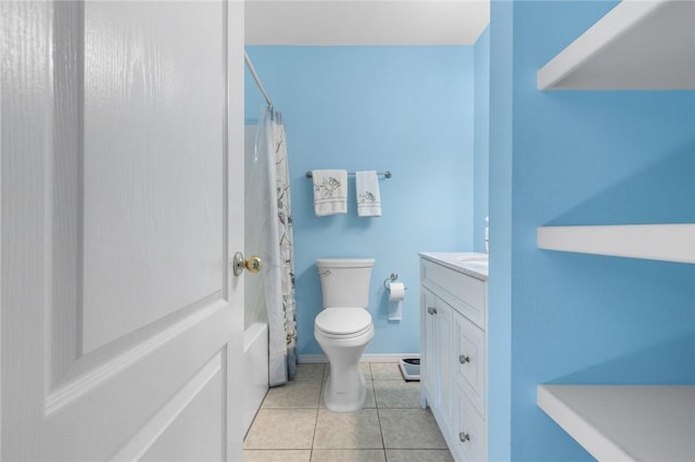 bathroom featuring toilet, shower / tub combo, tile patterned flooring, baseboards, and vanity