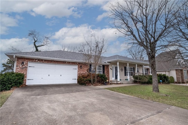 ranch-style home with brick siding, a porch, a front yard, driveway, and an attached garage