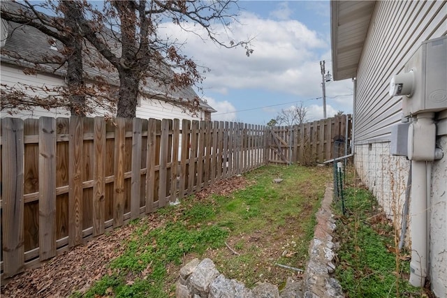 view of yard with a fenced backyard