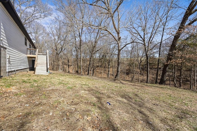 view of yard featuring stairs