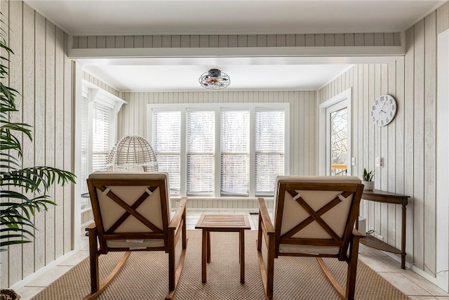 living area with light tile patterned floors