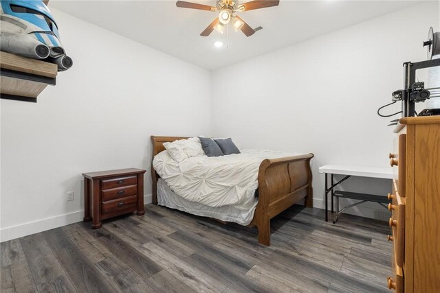 bedroom with recessed lighting, ceiling fan, baseboards, and wood finished floors