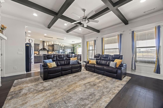 living area featuring dark wood-style floors, plenty of natural light, and coffered ceiling