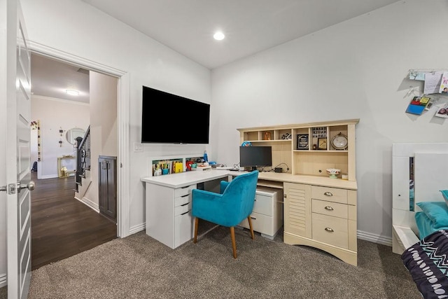 office area featuring recessed lighting, dark colored carpet, and baseboards