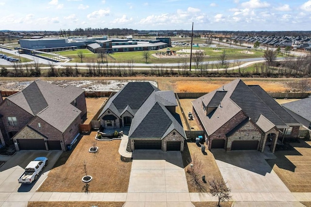 birds eye view of property with a residential view