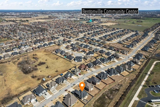 birds eye view of property with a residential view