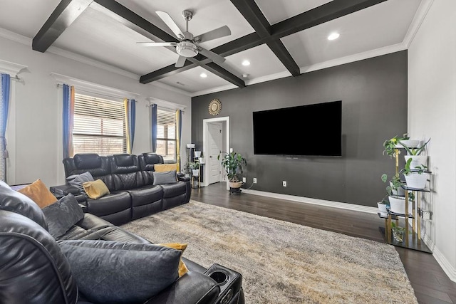 living room featuring beamed ceiling, baseboards, dark wood finished floors, and a ceiling fan