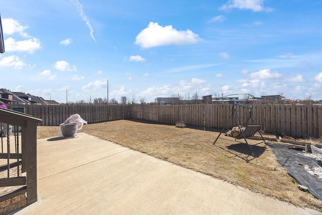 view of yard with a fenced backyard and a patio area