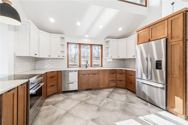 kitchen with a sink, open shelves, brown cabinets, and stainless steel appliances