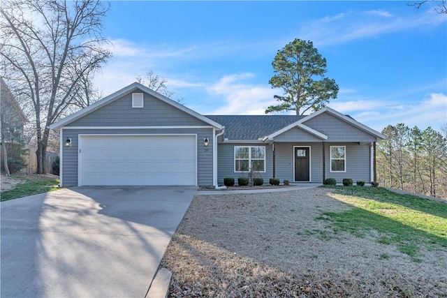 single story home featuring an attached garage, concrete driveway, a front lawn, and a shingled roof