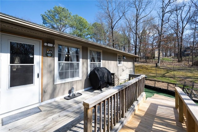 wooden terrace with grilling area