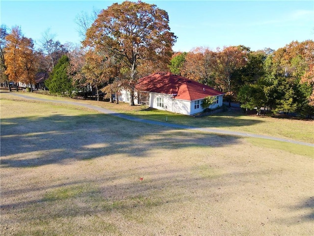 11 Saint Andrews Lane Holiday Island Unit 9, Holiday Island, AR 72631 - view of side of home featuring a lawn