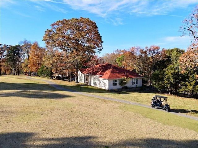 11 Saint Andrews Lane Holiday Island Unit 9, Holiday Island, AR 72631 - view of side of home with a yard and view of scattered trees