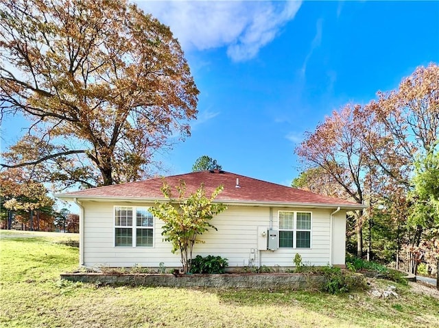 11 Saint Andrews Lane Holiday Island Unit 9, Holiday Island, AR 72631 - view of home's exterior with a yard