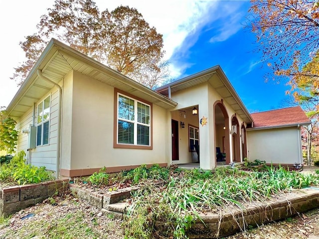 11 Saint Andrews Lane Holiday Island Unit 9, Holiday Island, AR 72631 - view of front of house featuring stucco siding