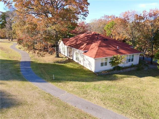 11 Saint Andrews Lane Holiday Island Unit 9, Holiday Island, AR 72631 - view of property exterior featuring a lawn