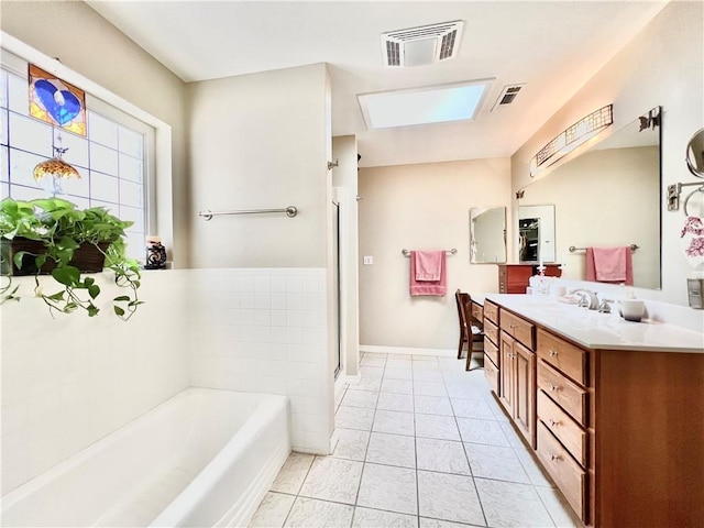 11 Saint Andrews Lane Holiday Island Unit 9, Holiday Island, AR 72631 - bathroom featuring vanity, a bath, a stall shower, and a skylight
