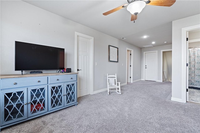 interior space featuring recessed lighting, carpet flooring, ceiling fan, and baseboards