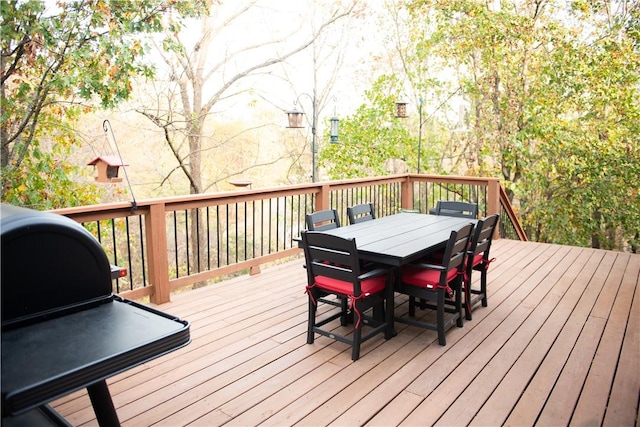 deck featuring outdoor dining area