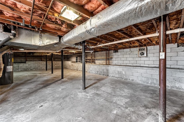 unfinished basement with water heater