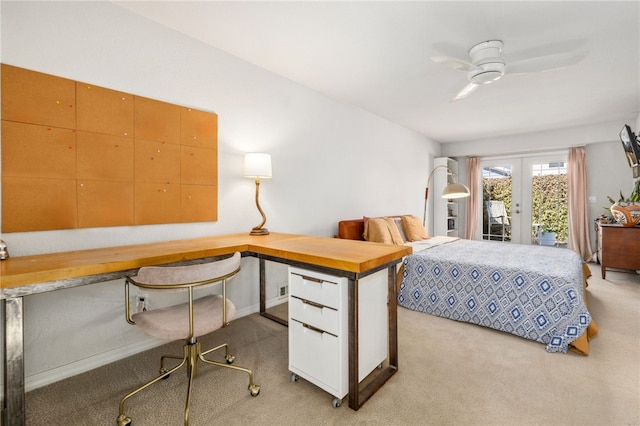 bedroom featuring access to exterior, french doors, carpet floors, and ceiling fan