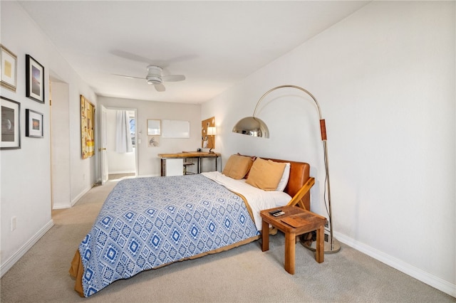 bedroom with baseboards, carpet floors, and ceiling fan