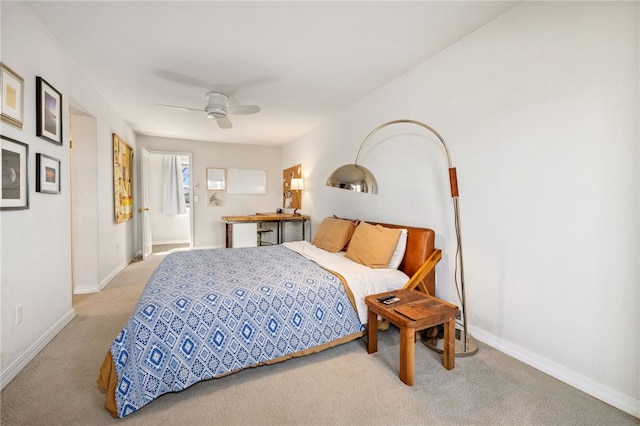 706 NW B St, Bentonville, AR 72712 - carpeted bedroom with baseboards and a ceiling fan