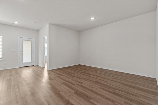 1317 Chavis St, Gentry, AR 72734 - spare room with wood finished floors and recessed lighting