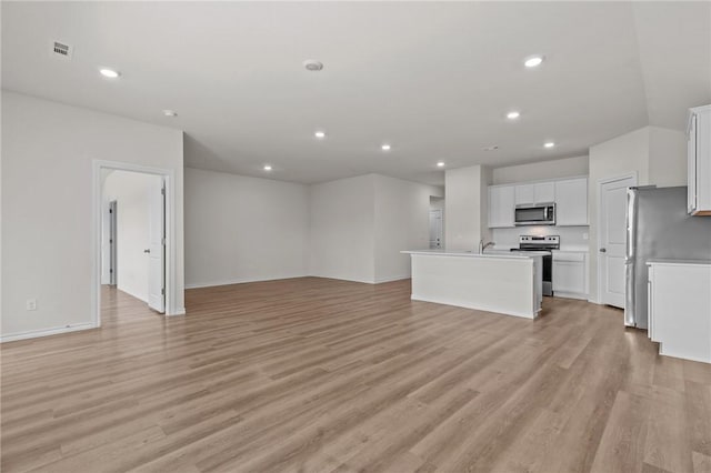 1317 Chavis St, Gentry, AR 72734 - unfurnished living room with recessed lighting and light wood-style flooring