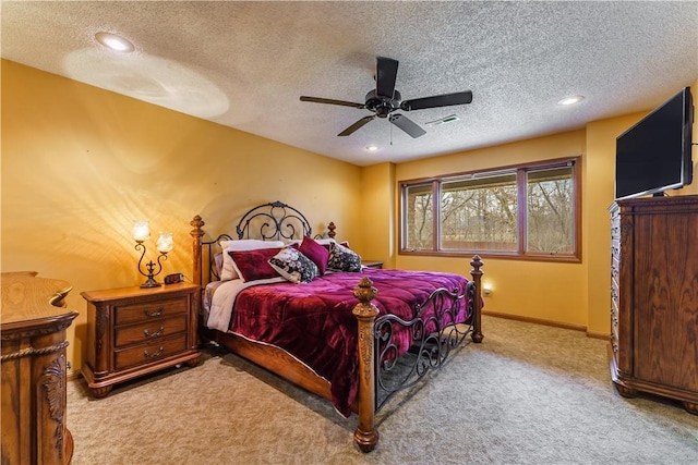 bedroom with carpet flooring, a textured ceiling, and baseboards