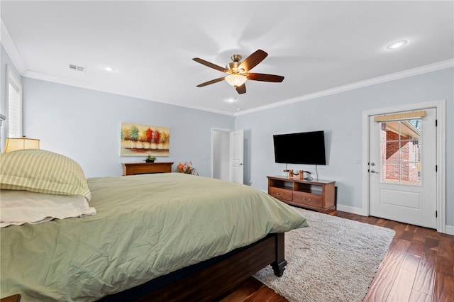 bedroom featuring visible vents, dark wood-type flooring, recessed lighting, crown molding, and baseboards