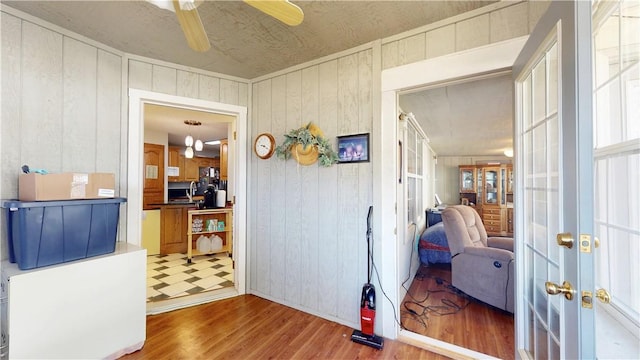 interior space with french doors and wood finished floors