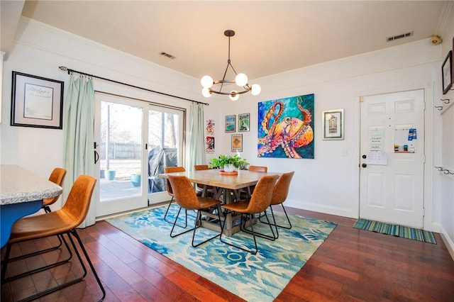 dining space featuring crown molding, baseboards, visible vents, and dark wood-style flooring