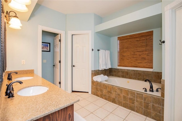 bathroom with a sink, a bath, double vanity, and tile patterned flooring