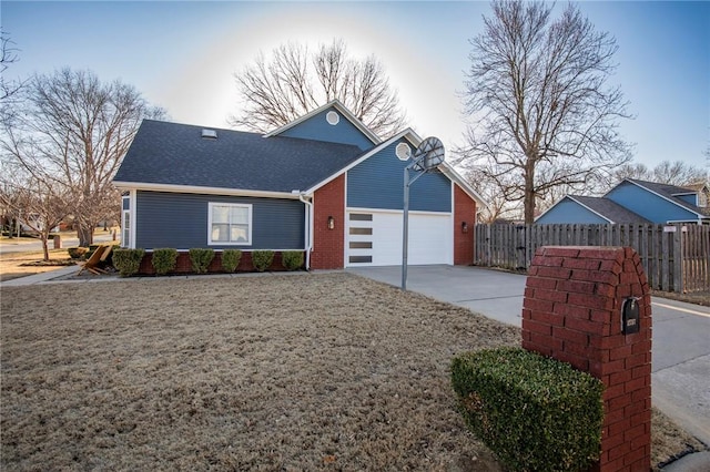 view of property exterior featuring brick siding, fence, concrete driveway, roof with shingles, and an attached garage