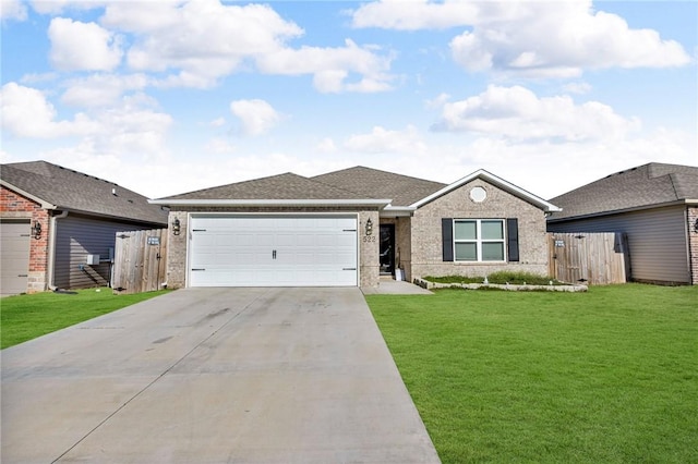 ranch-style home with a front yard, fence, a garage, and driveway