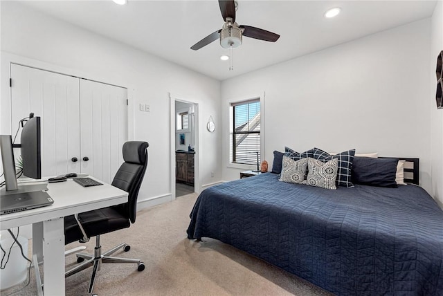 bedroom with light carpet, recessed lighting, a ceiling fan, and baseboards