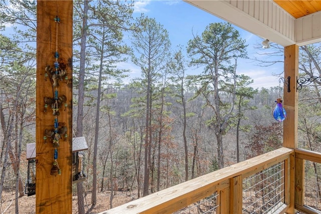 exterior space featuring a view of trees